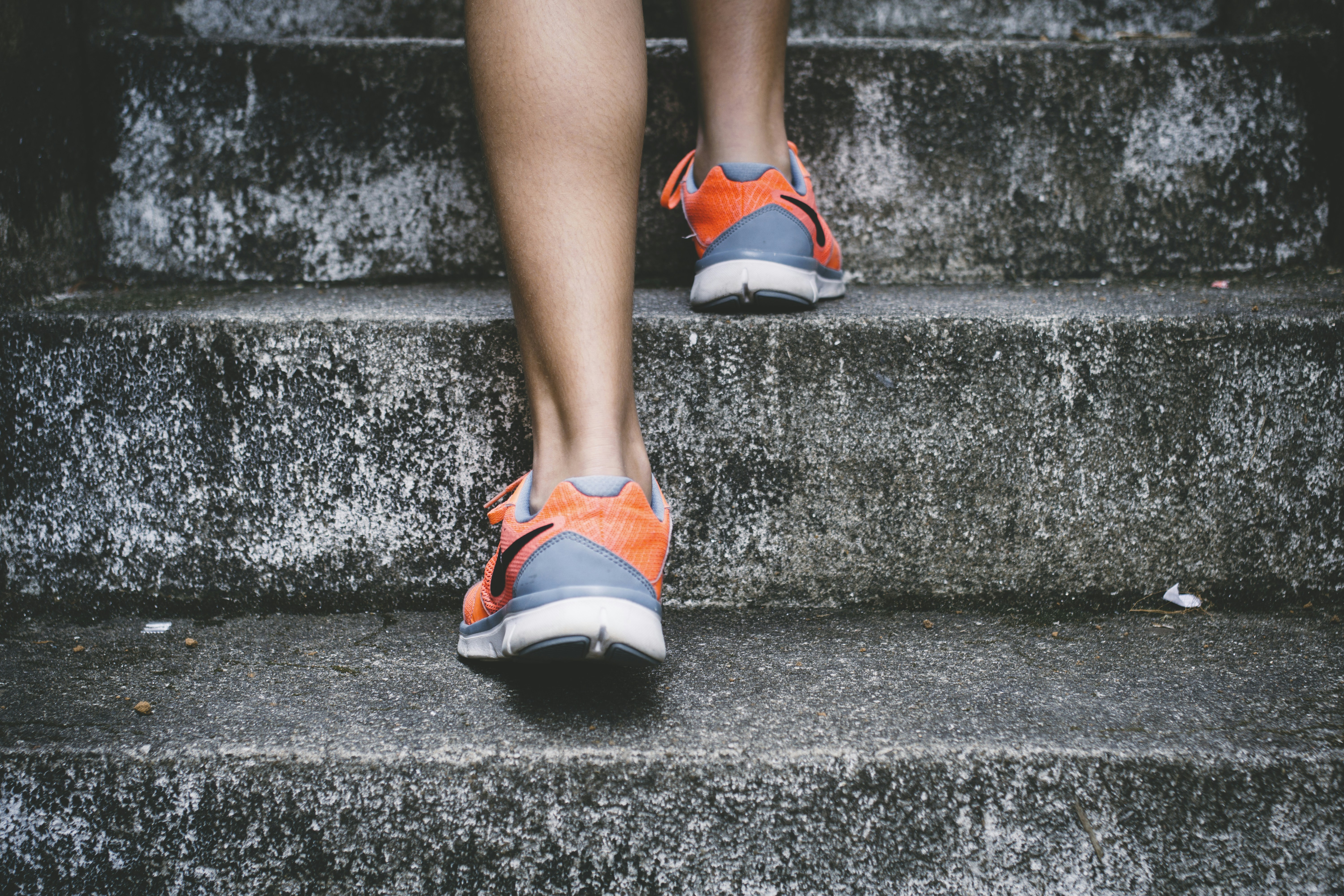 Person walking outdoors in warm sunlight — cardiometabolic health and active lifestyle in Florida